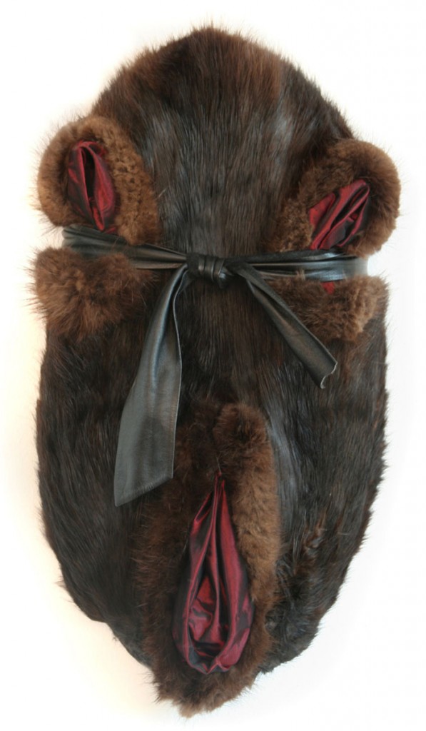 Abdication (2005), size: 50 x 27 x 10cm. Wood, furskin, leather, changeant. 