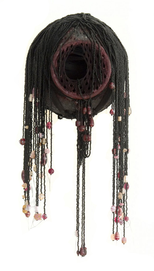 Sleazy (2010), size: 40 x 20 x 18cm. Pottery, beads, paint.